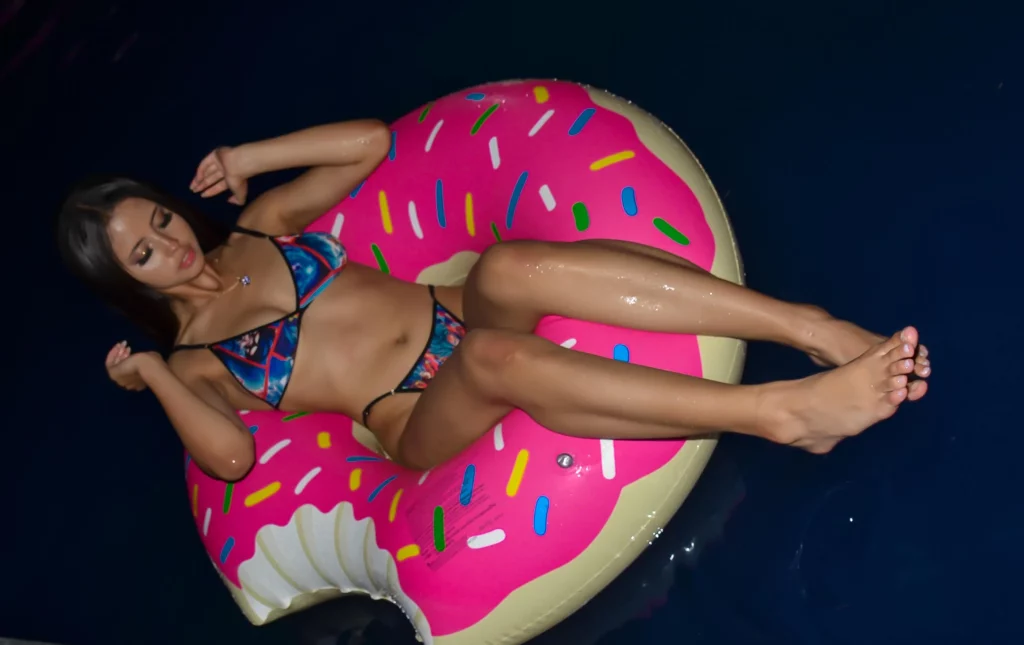 AntonellaDaMata is a sexy bikini floating in a donut 