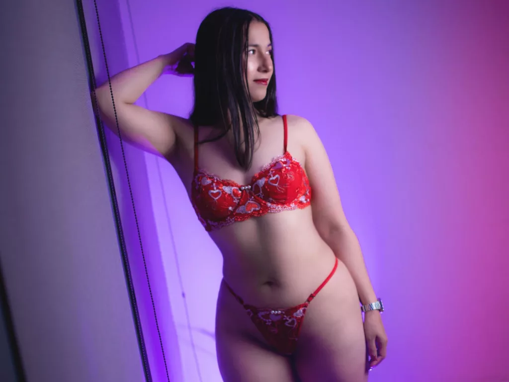 AnneStone shows off sexy body in her red bathe suit