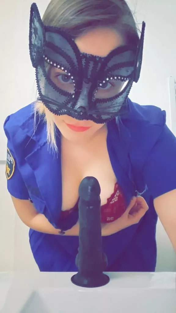 dreamsha poses as a cop with a huge black dildo