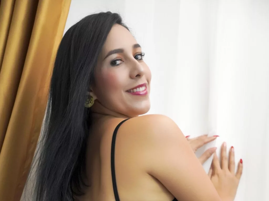 Katty’s average tits spill from her bra, blush on her cheeks.