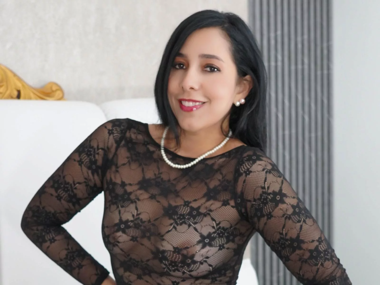 Katty’s nipples harden, exposed under delicate mesh lingerie.