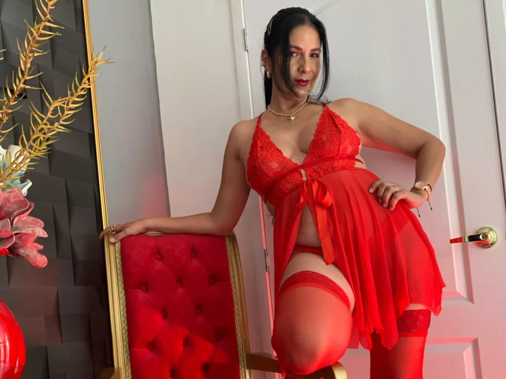 Mature milf pics: AlizonMoreti in red lace, thigh-highs, confident and bold.