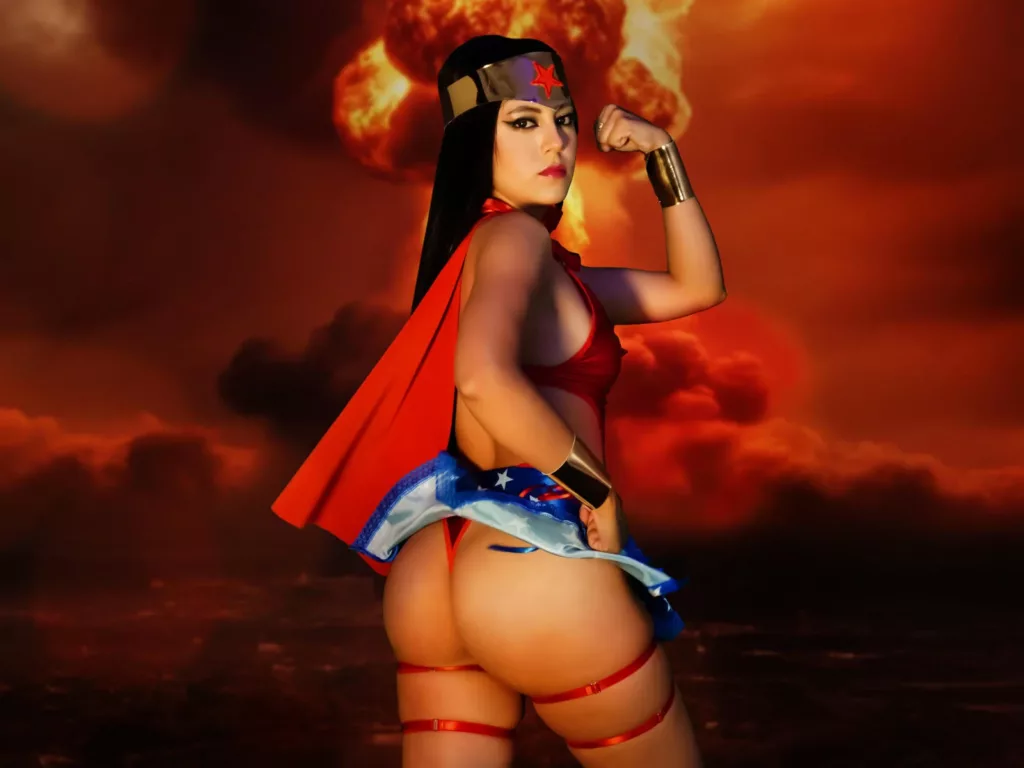 eimmypark as superheroine, red cape, bold stance, fiery Frog Leap position confidence.